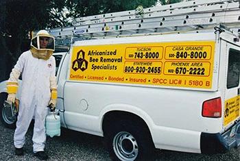 Cochise County bee removal service truck and employee